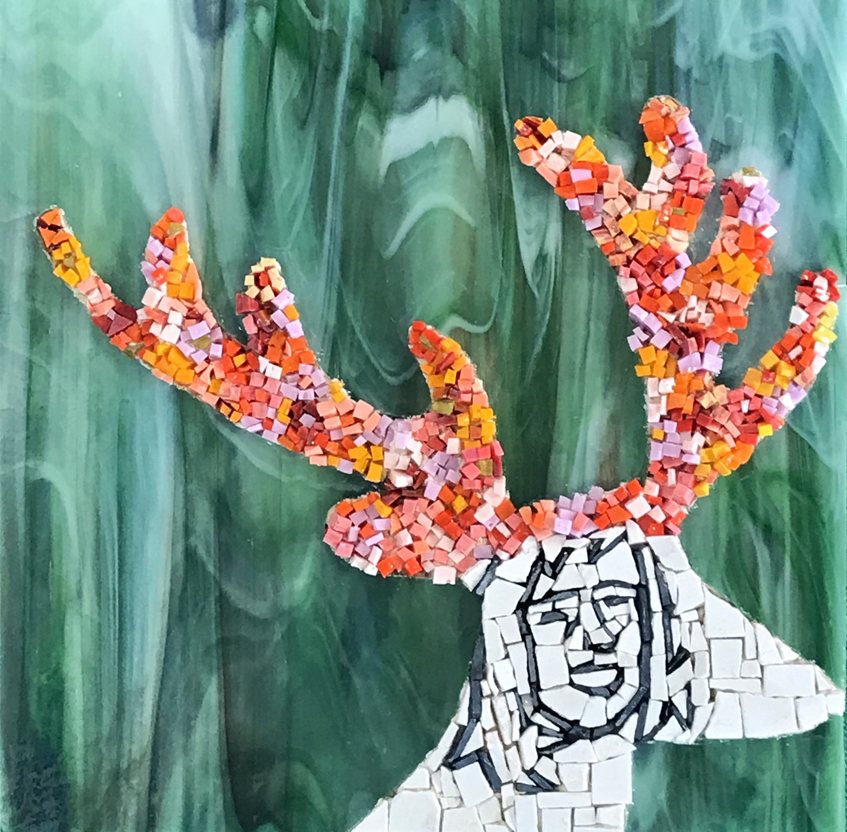 Birthday Girl, a portrait crowned with blossoming antlers in glass and smalti